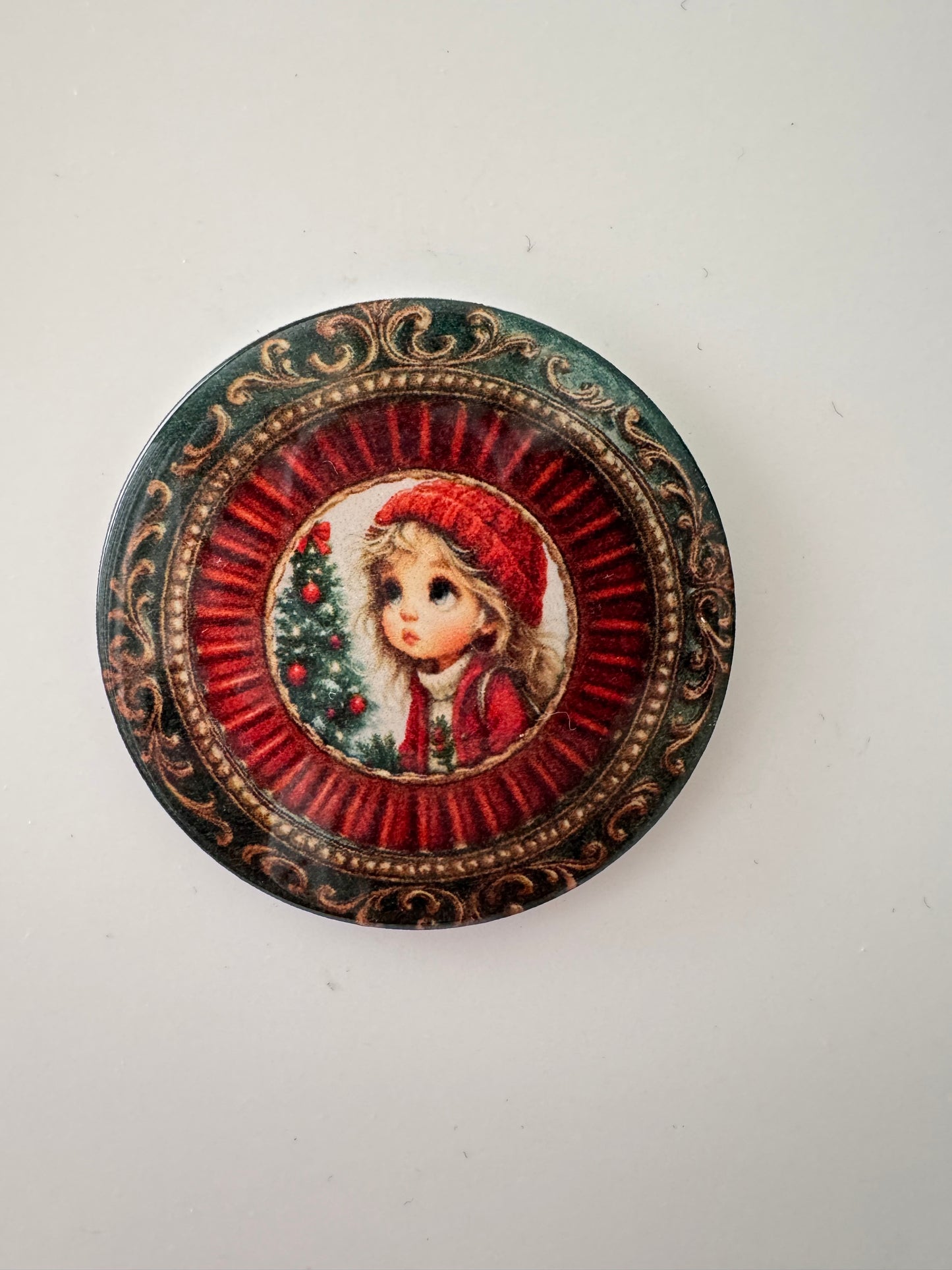 Christmas girl 2” round resin
